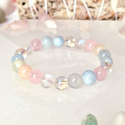 Pure Crystal's Abundance crystal bracelet will help you heal your heart, embrace joy, and manifest whatever your heart desires. The bracelet is made with high-quality crystal beads of Aquamarine, Aura Quartz, Morganite, Rose quartz and Moonstone