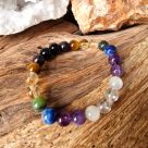 Bracelet withLapis Lazuli, Amethyst, Aura Quartz, Moonstone, Garnet, Tiger's eye and obsidian crystal beads 